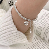 Pulseira elegante com coração em prata