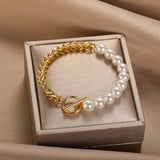 Pulseira elegante em ouro com pérolas