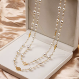 Colar elegante em ouro com pérola