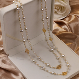 Colar elegante em ouro com pérola