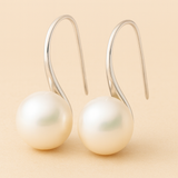 Elegantes brincos de gota com pérolas