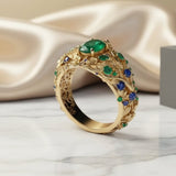 Anel com cristais verdes e azuis