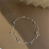 Pulseira ajustável com coração em prata