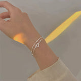 Pulseira ajustável com coração em prata