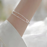 Pulseira ajustável com coração em prata