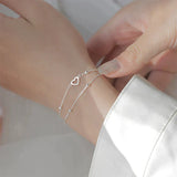 Pulseira ajustável com coração em prata