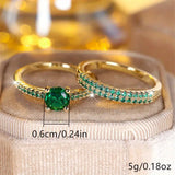 Conjunto de Anel Duo com Esmeralda em Ouro