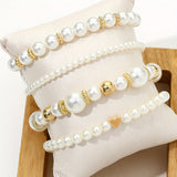 Conjunto de elegantes pulseiras de coração com pérolas