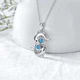 Colar de Prata com Golfinhos Duplos e Cristal Azul